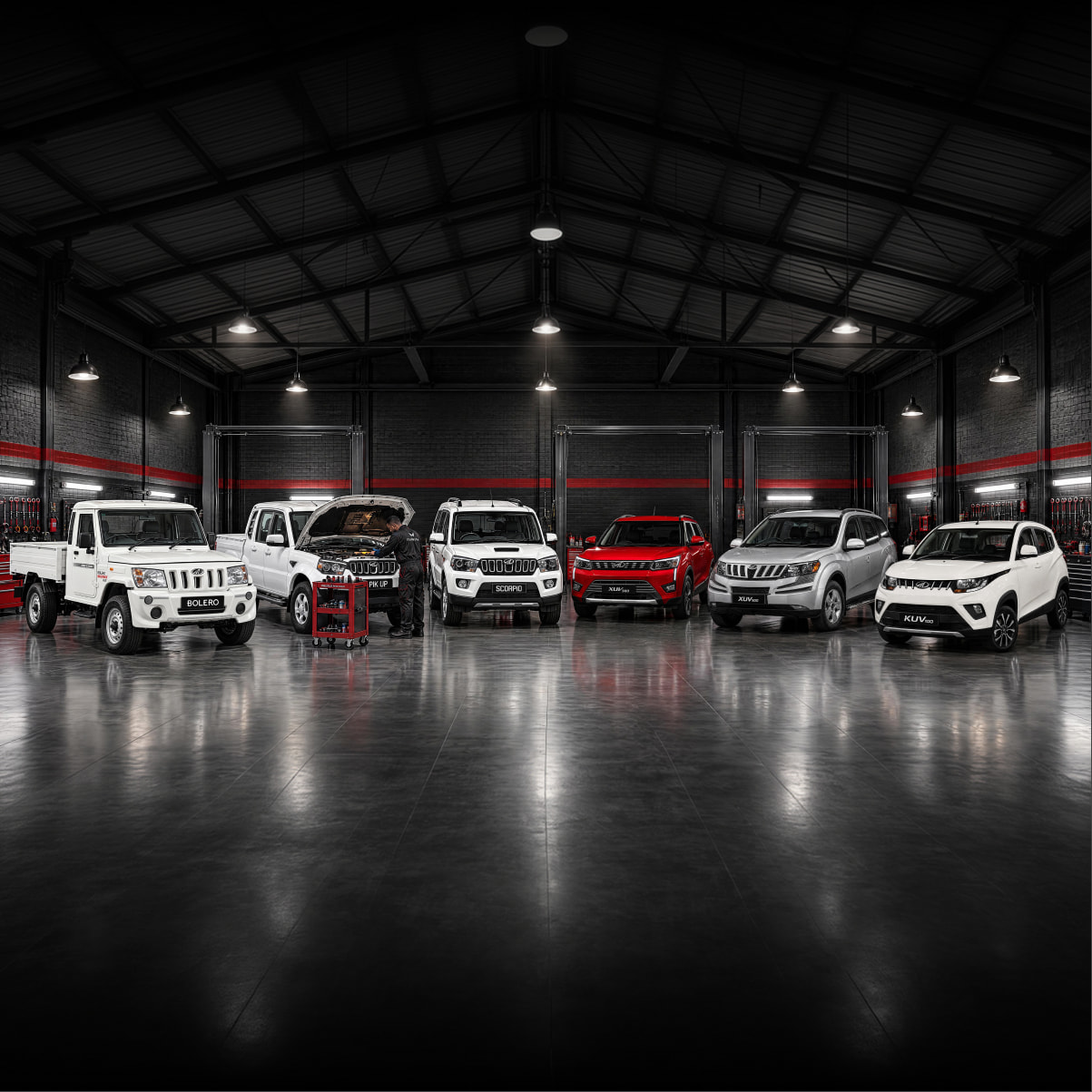 Mahindra vehicles in a service workshop