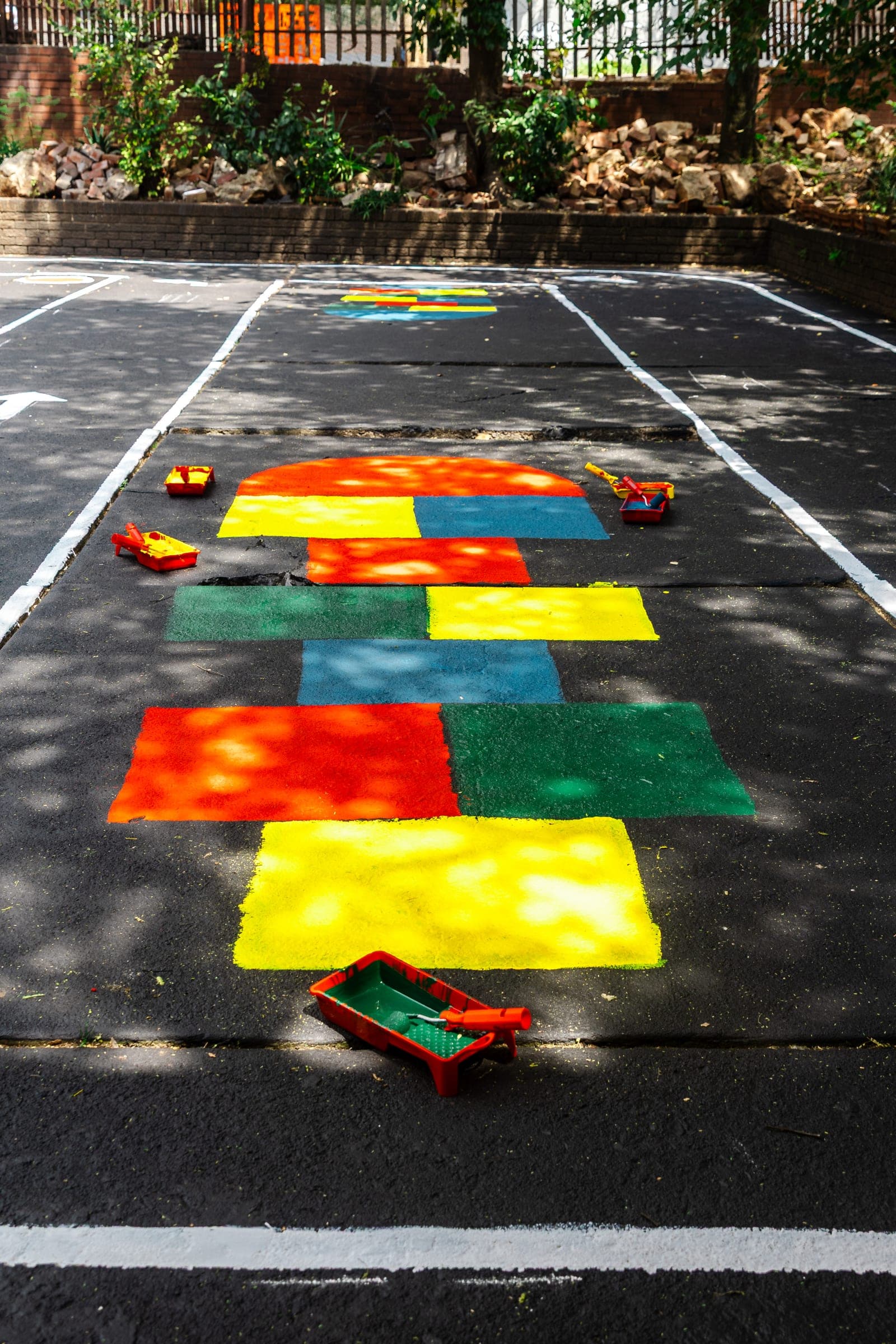 Colourful painted Mini Learning Road Park with toy cars on the asphalt
